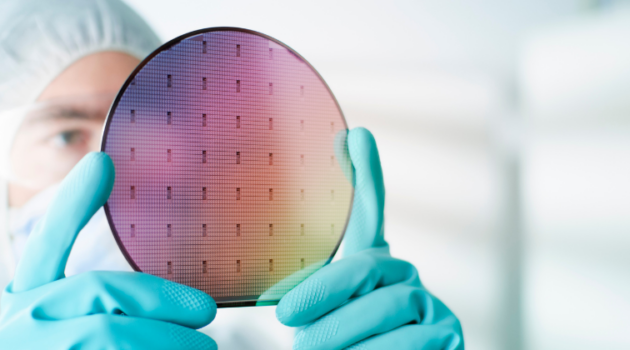 Scientist holding wafer