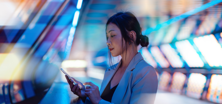 woman holding cell phone