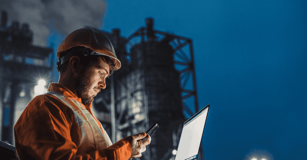 refinery worker with laptop