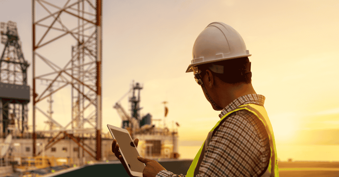 oil and gas worker with tablet